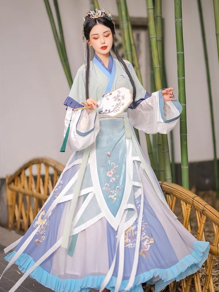 The Elegant Cheongsam and Its Stylish Floor-Length Clothes Rack The Elegant Cheongsam and Its Stylish Floor-Length Clothes Rack