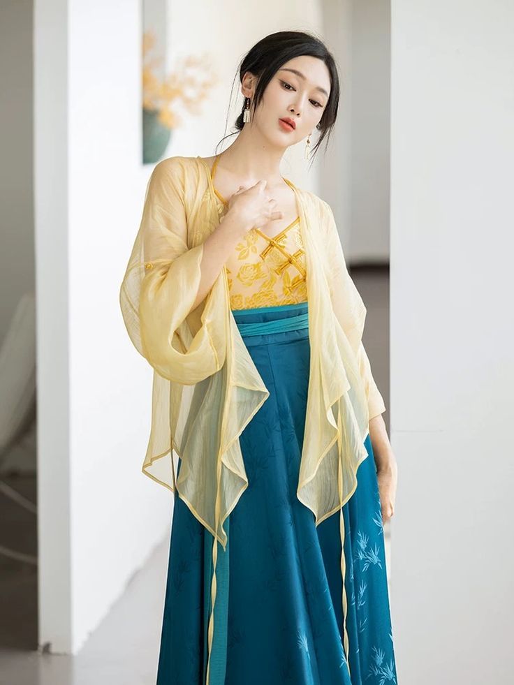 The Elegance of Long Cheongsam Skirts with Fish-Tail Design The Elegance of Long Cheongsam Skirts with Fish-Tail Design