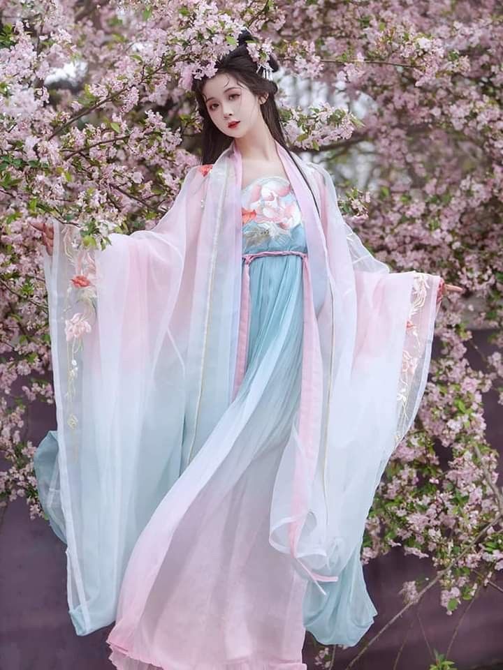 The Red-毛衣 Traditional Tang Suit:A Blend of Fashion and Culture The Red-毛衣 Traditional Tang Suit:A Blend of Fashion and Culture